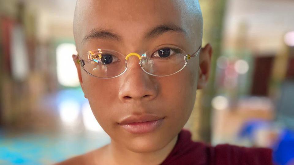 Young Buddhist with OneDollarGlasses
